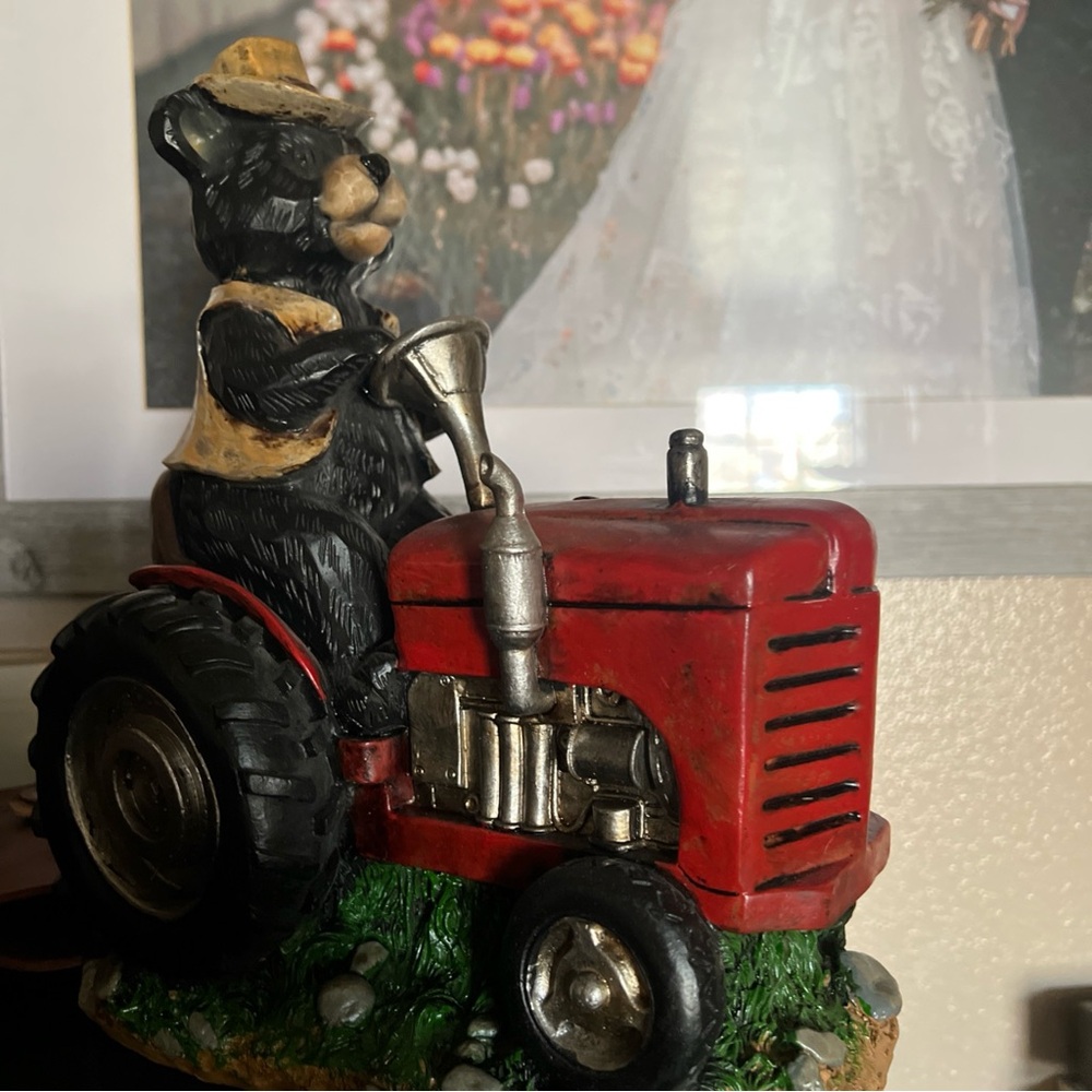 Charming Black Bear on Red Tractor Figurine